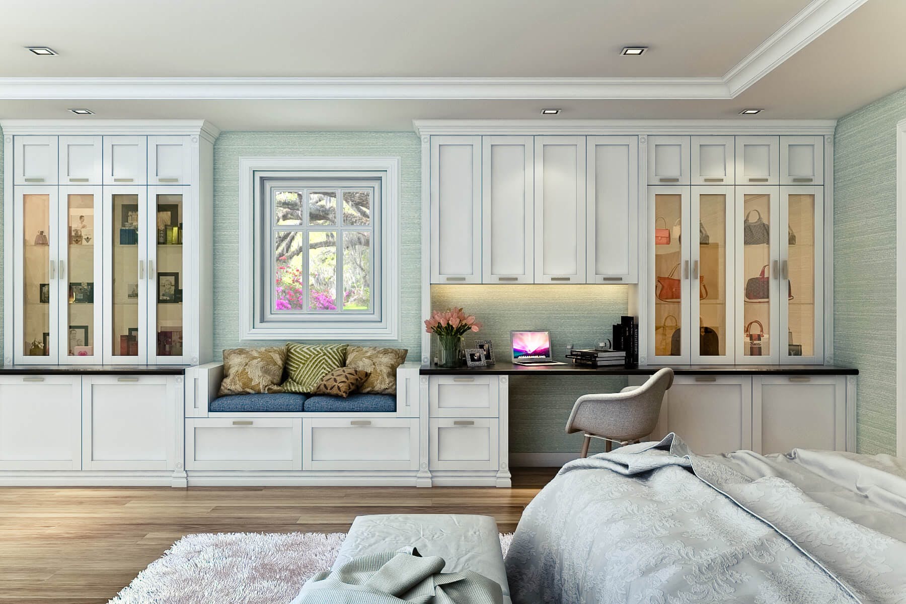 White shaker style custom wall unit in bedroom has window seat and workstation with upper cabinets and downlighting.