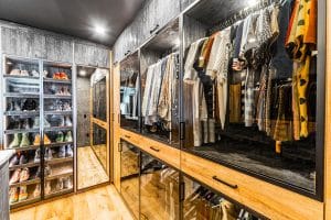 Brutalist closet with glass doors